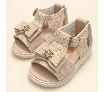 Sandalia Notuerce Niña Beige con Moño y Flor Dorada