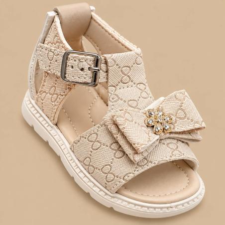 Sandalia Notuerce Niña Beige con Moño y Flor Dorada
